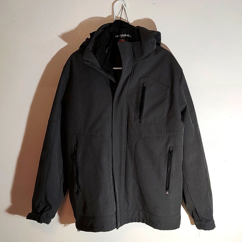 This listing is for a gently used men's hooded winter coat.